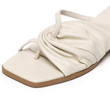 Hunera Asymmetric Pleated Low Heels Sandals (Cream)